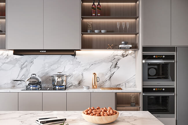 Modern kitchen with Grey cabinets, stainless steel appliances, and a marble countertop